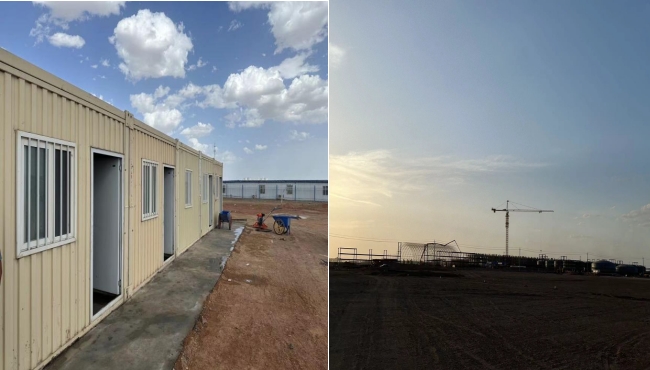 萬頃黃沙映壯志，樓閣巍巍矗風(fēng)沙